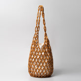 Sac à main découpé et creux avec design d'intérêt spécial et décoration de perles en bois Sac à bandoulière seau portable